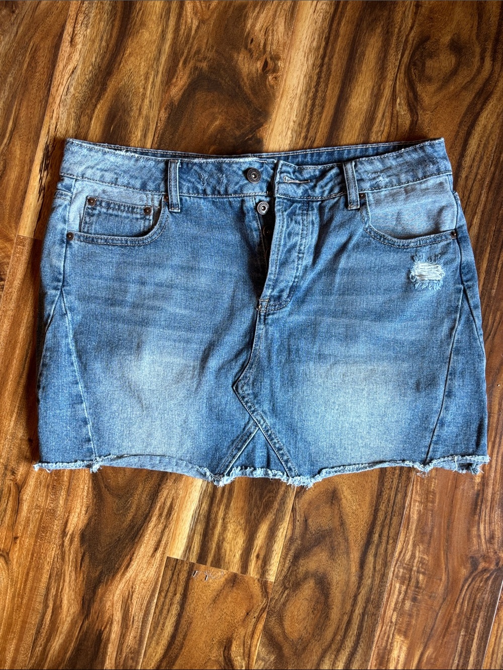 Maurices Light Blue Denim Mini Skirt with Raw Hem
